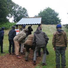 A group of people outside Description automatically generated with low confidence